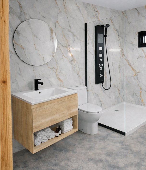 Baño con ducha de hidromasaje en una cabaña de Carnota